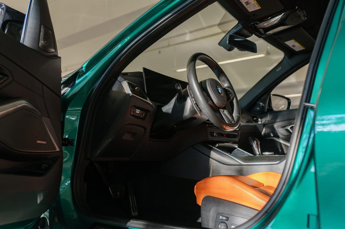 Green BMW M3 Competition G80, rental photo 11 of 23