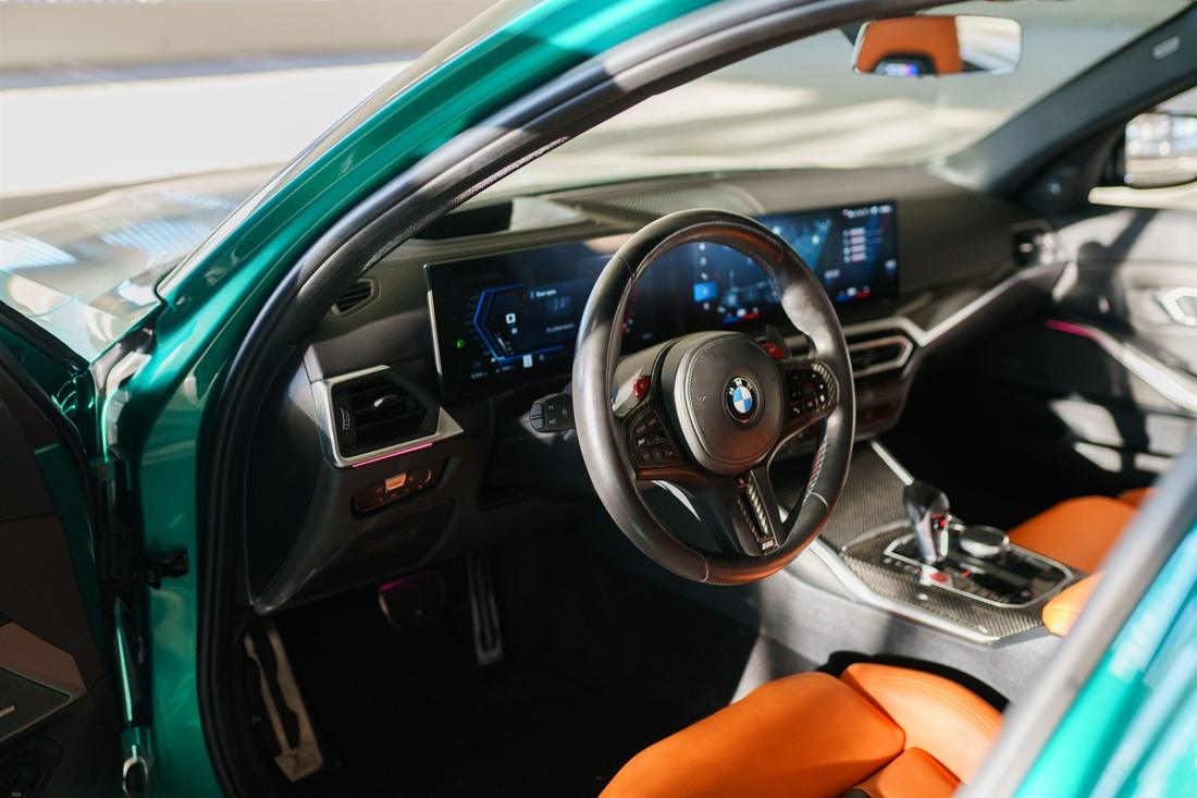 Green BMW M3 Competition G80, rental photo 20 of 23
