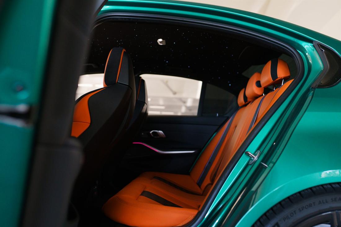 Green BMW M3 Competition G80, rental photo 21 of 23