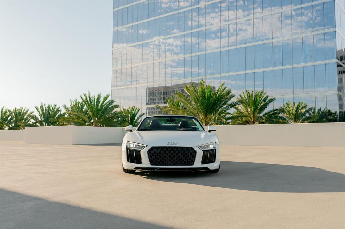 White Audi R8 Spyder convertible, rental photo 2 of 25