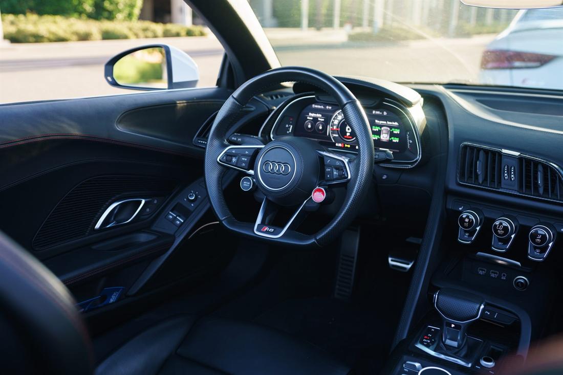 White Audi R8 Spyder convertible, rental photo 21 of 25