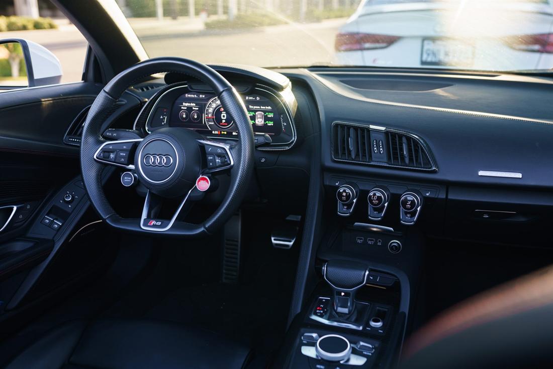 White Audi R8 Spyder convertible, rental photo 22 of 25