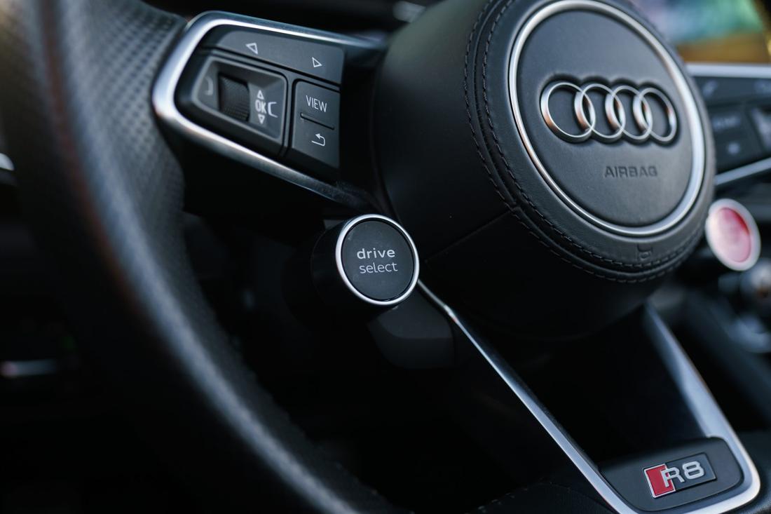 White Audi R8 Spyder convertible, rental photo 24 of 25