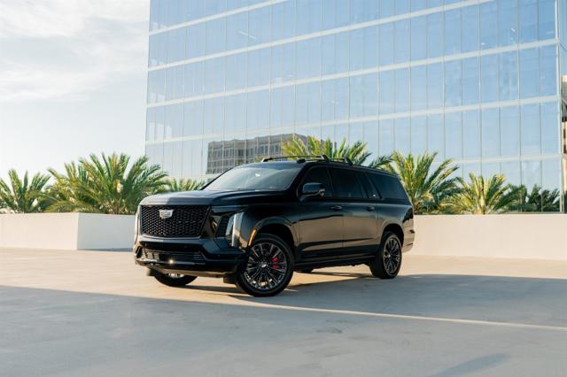 Black 2026 Cadillac Escalade with red interior rental in Los Angeles