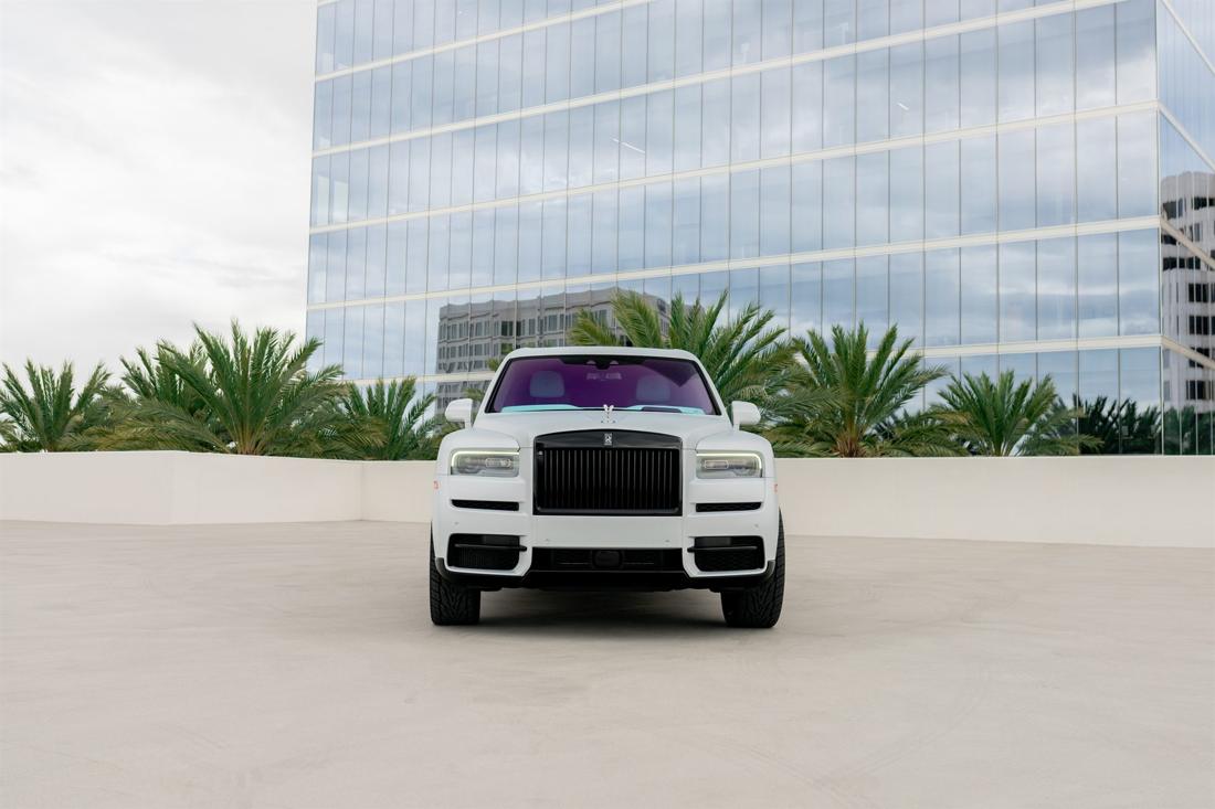 Satin white Rolls-Royce Cullinan SUV available for rent in Los Angeles